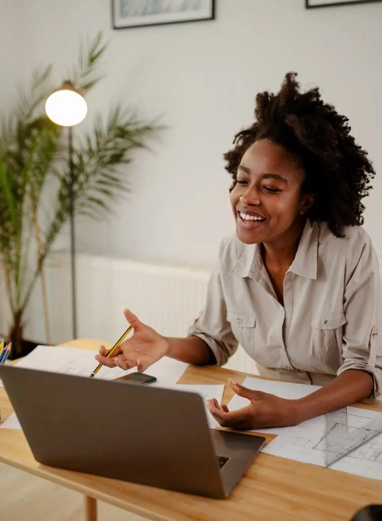 business woman using a laptop in home office